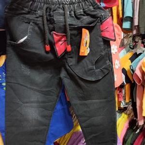 شلوار لی دخترانه زغالی جیب عروسکی خارجی دمپا کش در شش سایز 40 45 50 55 60 65