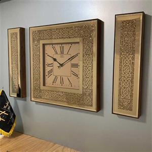 ساعت دیواری آینه ای 6526 همراه با گوشواره تولیکا