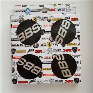 کاپ رینگ و آرم چرخ ماشین طرح BBS مشکی  نوشته نقره ای مناسب تمام رینگهای اسپرت با سایز 030 ( پژو .پراید. ال نود و..)