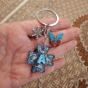 سرکلیدی رزینی آبی پروانه دار