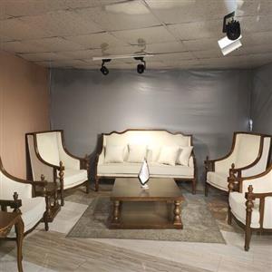 مبل کلاسیک پایه خراطی 7 نفره چوب توسکا به همراه میز و عسلی المپیک پارچه جاسمین خارجی با فوم سرد پیک 4سال ضمانت