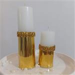 شمع  سفید با تزئین شبرنگ طلایی و نوار نگین دار  (پک 2 عددی)