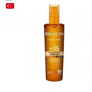 روغن ضد آفتاب و برنزه بیوکسین Bioxcin Sun Care All Skin Bronzing Oil Spf 15 حجم 200 میلاصل کشور ترکیه 