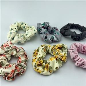 کش مو مدل گلدار در  پک 12عددی با رنگ های مختلف