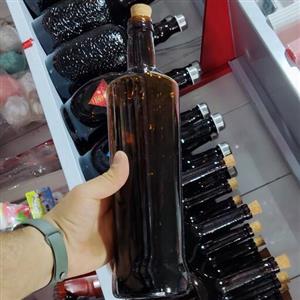 بطری شیشه 1 لیتری قهوه ای تیره با درب چوب پنبه خور
