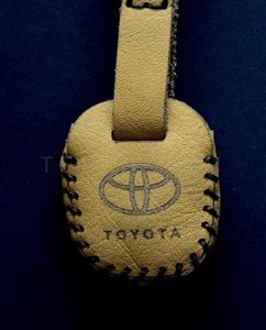 کاور چرم تویوتا دو دکمه رنگ کرم