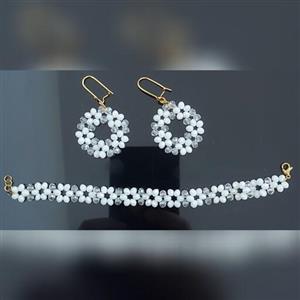 ست دستبند و گوشواره کریستالی طرح گل