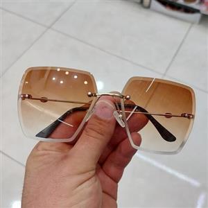 عینک آفتابی زنانه فریملس یووی 400 رنگ عدسی نسکافه ای هایلایت 