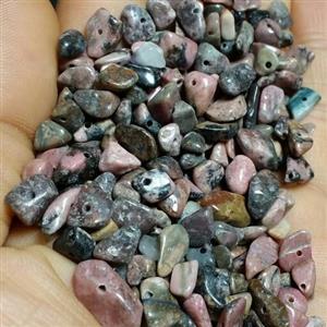 مهره دفرمه یا چیپسی سنگ رودونیت طبیعی گرمی نه هزار تومان