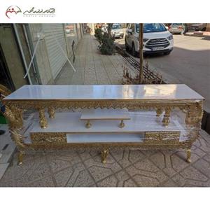 میز تلویزیون از جنس آلیاژ و ام دی اف طرح طاووس تاجدار و گل