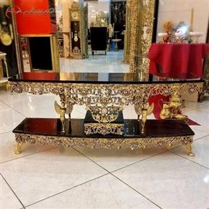 میز تلویزیون نیم گرد آلومینیومی و ام دی اف مشکی، مدل گل سرخ برجسته