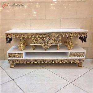 میز تلویزیون آلومینیومی با ام دی اف هایگلس سفید رنگ، مدل ملکه ایستاده