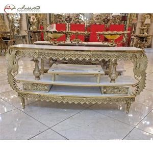 میز تلویزیون از جنس آلومینیوم و ام دی اف هایگلس طرح طاووس و پروانه کوچک