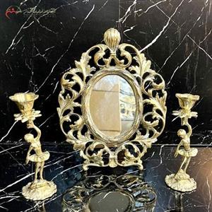 آینه و شمعدان آلومینیومی بیضی شکل طرح برگ درخت و طلایی رنگ