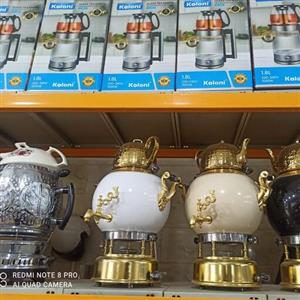 چایسازروهمی کولونی دسته استیل وارمردار کتری قوری شیشه پیرکس باضمانت شرکتی کتری و قوری  سماورگازی8لیترضخیم3100