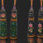 میل باستانی با نقاشی لاکی روغنی  با ارتفاع یک متر بارنگهای معدنی وگیاهی نقاشی شده نقاشی گل ومرغ وتذهیب وخط باچوب راش