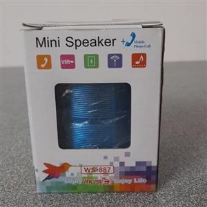 مینی اسپیکر  بلوتوثی وقابل حمل دارای رنگ بندی های مختلف -ابی-قرمز-نقری-مشگی-زرد