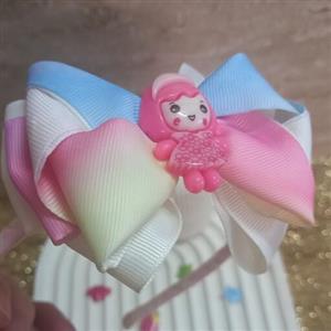 گل سر (تل سر) در انواع رنگ های مختلف وزن  کم ، جنس پارچه گروگن و ربان ساتن  بسیار مدرن و شیک برای بانوان ایران