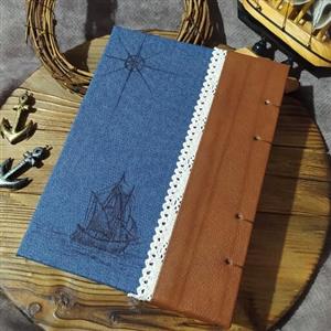 دفتر جلد سخت جین و چرم دریا، 19 در 14 ، صد برگ کاغذ نخودی رنگ بدون خط ،چرم گوسفندی لباسی سنجدی رنگ و جین آبی، حکاکی شده