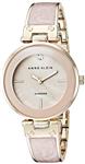 Anne Klein Women s AK/2512LPGB Diamond-Accented Gold-Tone and Blush Pink Marbleized Bangle Watch