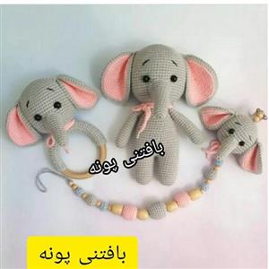 عروسک جغجغه وبندپستونک فیل دستبافت درغرفه بافتنی پونه.جغجغه وبند پستونک بااسم نوزادتون..قیمت مناسب کیفیت عالی