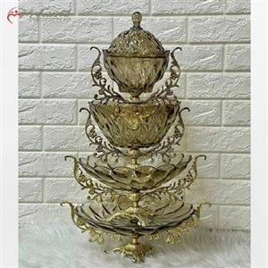 سرویس چهار تکه کریستالی شامل شیرینی خوری آجیل خوری میوه خوری و شکلات خوری، پایه برنزی رنگ فورتیک