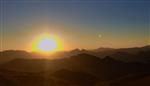 فوتیج طلوع آفتاب از پشت کوه ها تایم لپس