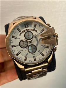 ساعت مچی مردانه دیزل شاخدار رزگلد صفحه کرمی  DZ 312