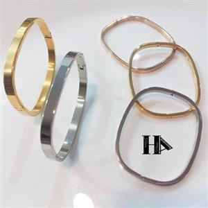 النگو کارتیر استیل و رنگ ثابتطلایی و نقره ای شش میل