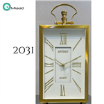 ساعت رومیزی فلزی آرتمیس مدل 2031، ساعت رومیزی خاص و فلزی با صفحه سفید و اعداد رومی، دارای تنوع رنگی، رنگ طلایی صفحه سفید