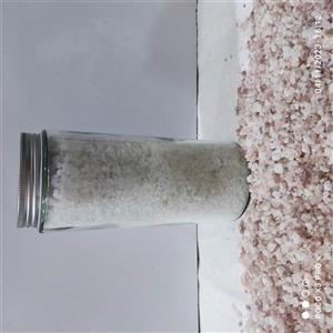 دلنمک جهرم 1400گرمی در ظرف شیشه ای استوانه ای با درب کانتینری فلزی دهانه 82میلیمتر