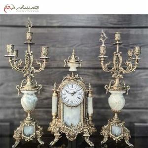 ست ساعت رومیزی و شمعدان با بدنه ی برنزی به رنگ فورتیک و طراحی بسیار شیک مناسب دکوراسیون کد 473