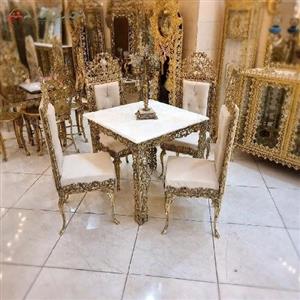 میز ناهار خوری 4 نفره تمام برنزی با رویه سنگ سفید و رنگ بندی متنوع پارچه