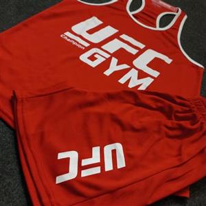 ست مردانه تاپ قهرمانی و شلوارک سوزنی UFC کد 51018 