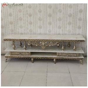 میز تلویزیون دو طبقه برنزی رویه ام دی اف و رنگ طلایی با کیفیت و دارای ضمانت دوام و رنگ بدنه