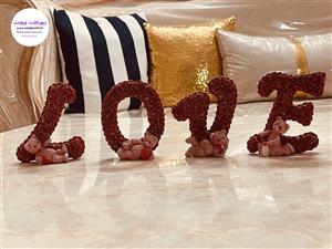 مجسمه لاو رومیزی جنس پلی استر رنگ قرمز طرح رز