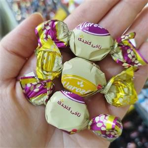 شکلات تافی مغزدار کنجدی مینو - 500 گرم