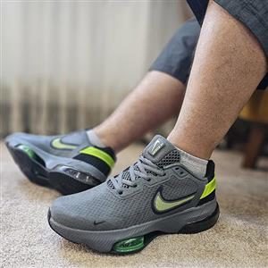 کفش کتونی مردانه نایک رنگ خاکستری تیره Nike 704 DG 