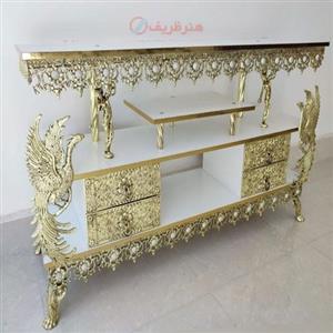 میز تلویزیون جنس آلیاژ آلومنیوم آبکاری برنز در طرح 2 ملکه دارای 4 کشو کد 0a-325