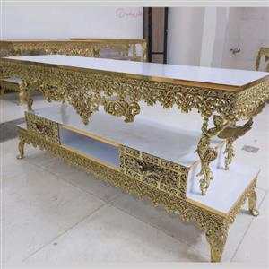 میز تلویزیون مدل فرشته های تاج دار جنس آلیاژ آلومینیوم آبکاری برنج کد 0a-387