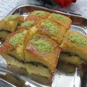 کیک شامی(کیک باقلوا پسته ای)خانگی فوق العاده تردوخوش عطروبو دارای لایه میانی مخلوط پودرمغز پسته کال و پودرهل 