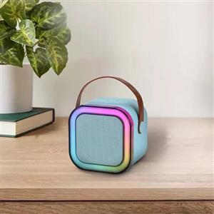 اسپیکر بلوتوثی قابل حمل کیوا مدل kiva-12 به همراه میکروفون بی‌سیم