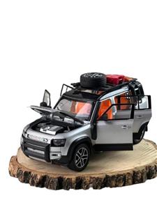 ماکت رنجرور دیفندر با لوازم سفر(RANGE ROVER VELOCITY)1/24