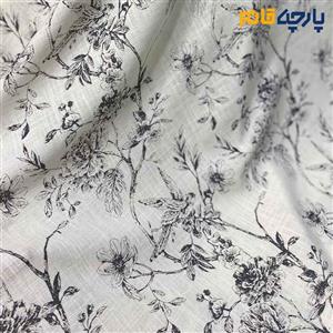 پارچه بهاره تابستانه لینن طرحدار ایتالیایی زمینه کرم شیری گل مشکی خطی کد ۴۹۸۱