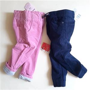 شلوار مخمل کبریتی  دولایه دورنگ سرمه ای صورتی دارای لایه آستر نخی و بند تنظیم دم پا گتر جلو شلوار دکمه دارد فاقد زیپ