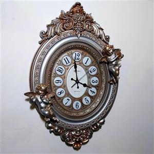 ساعت دیواری فرشته نوازنده برند زرین
