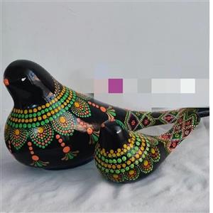 پرنده سفالی نقطه کوبی
