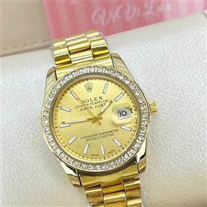 ساعت رولکس زنانه صفحه مشکی بند جوبیلی طلایی نقره ای ایندکس نگین Rolex Datejust