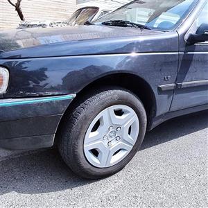 قالپاق اسپرت پژو 405 طرح تارا سایز 14 اینچ رینگ و لاستیک فابریک چرخ ماشین پژویی دوررینگ فابریکی پژویی 