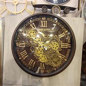 ساعت دیواری اویسا مدل چرخ دنده ای متحرک قطر 50